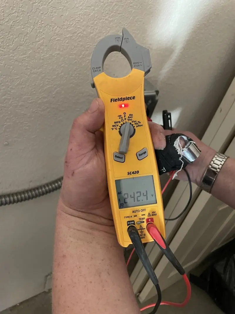 Voltage testing with clamp meter during Generator Installation in Norton